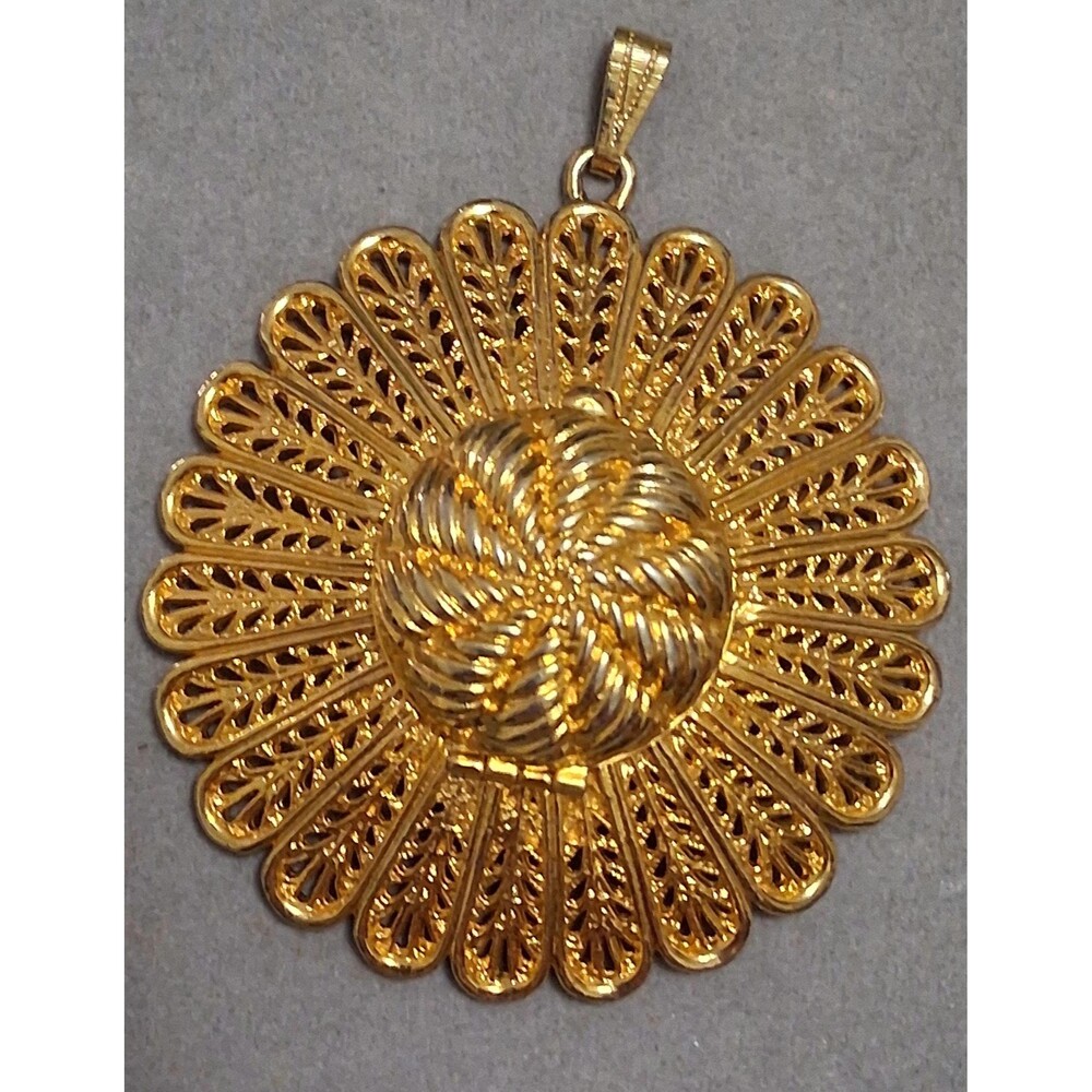 Jacoby Bender gold plated flower pendant, watch locket? filigree textured style,